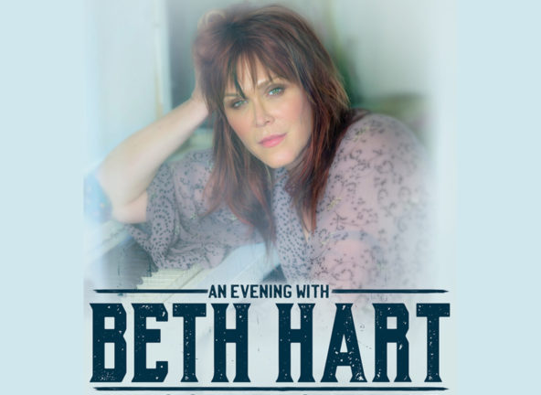 Beth Hart, head on hand at piano