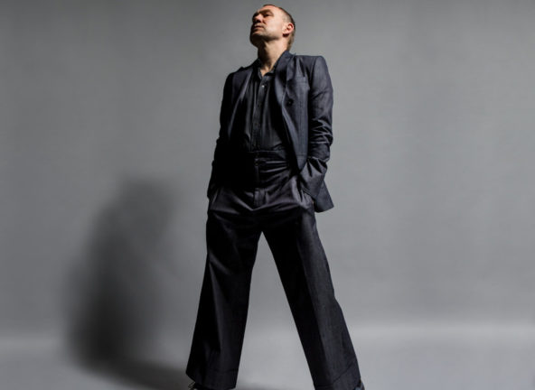 David Gray standing tall with grey backdrop