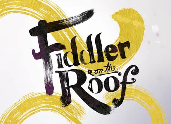 Brush-written lettering, swirls: Fiddler on the Roof