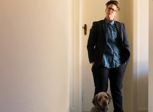 Hannah Gadsby looking puzzled with dog