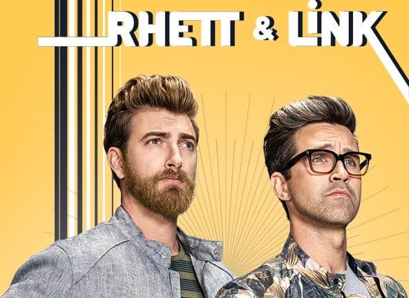 Rhett & Link staring off into the distance with yellow background