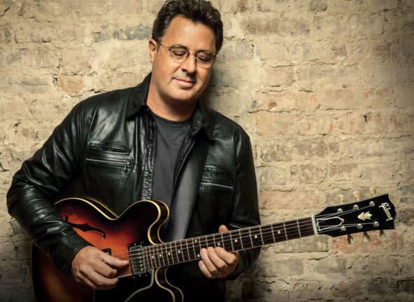 Vince Gill holding guitar