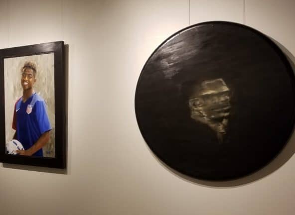 Portraits from the "Immigrant Stories" exhibit featuring work by artists Syed Hosain and Joe Burns
