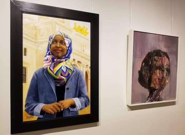 Portraits from the "Immigrant Stories" exhibit featuring work by artists Syed Hosain and Joe Burns