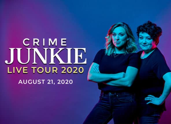 Ashley and Brit of Crime Junkie pose in front of a blue background