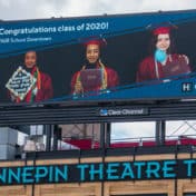 FAIR school graduates shine on a billboard