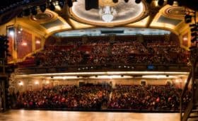 A view from the stage of the Orpheum Theatre, looking at people in the audience