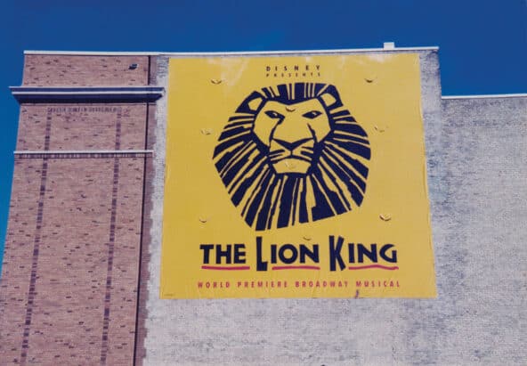 The Lion King banner hangs on the side of the Orpheum Theatre in Minneapolis, MN