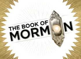 The Book of Mormon with a silver doorbell