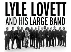 A black and white photo of Lyle Lovett's 15-person band dressed in formal attire standing in a line including Lyle in the middle. The words Lyle Lovett and His Large Band appear above the group in all-caps black block letters.